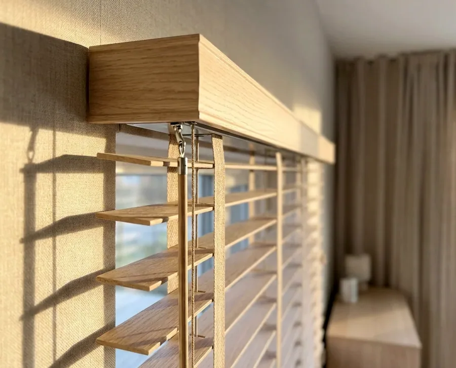 Close-up of a timber venetian headrail, ladder strings and tilt mechanism — blind repairs and restringing in Parkview